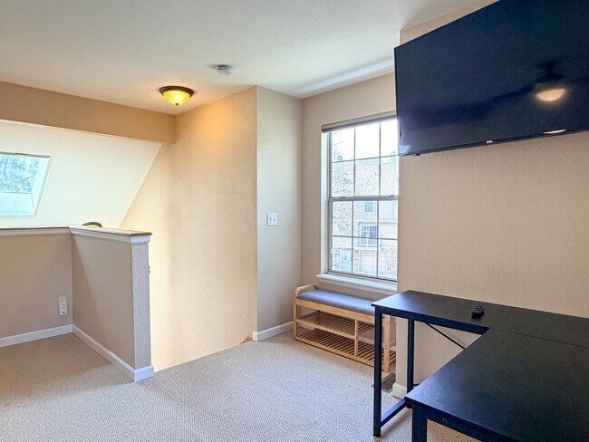 Building Photo - Open and Bright Corner Unit