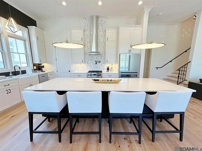 Building Photo - 3118 Pointe-Marie Dr