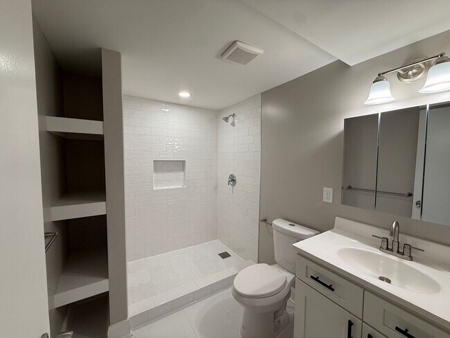 Building Photo - New Everything 4BR Townhome with Private Lower Level Suite | Stainless Kitchen | LVP + New Carpet...