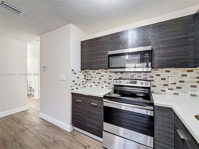 Building Photo - 1800 NW 52nd Ave