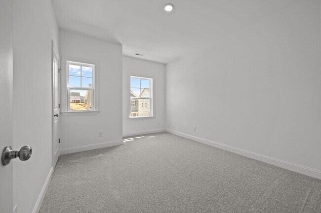 Building Photo - Brand-New 5BR/4BA in Knightdale’s Stoneriver – Luxury Living with 3-Car Garage