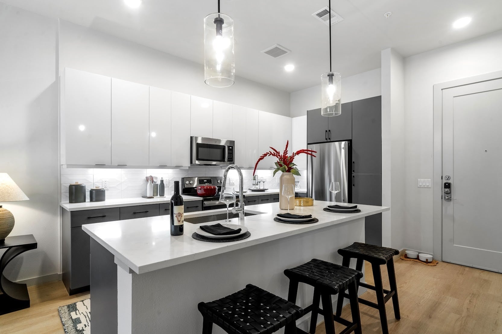 Explore this contemporary kitchen, perfect for culinary creativity and elegant dining. - The Emory