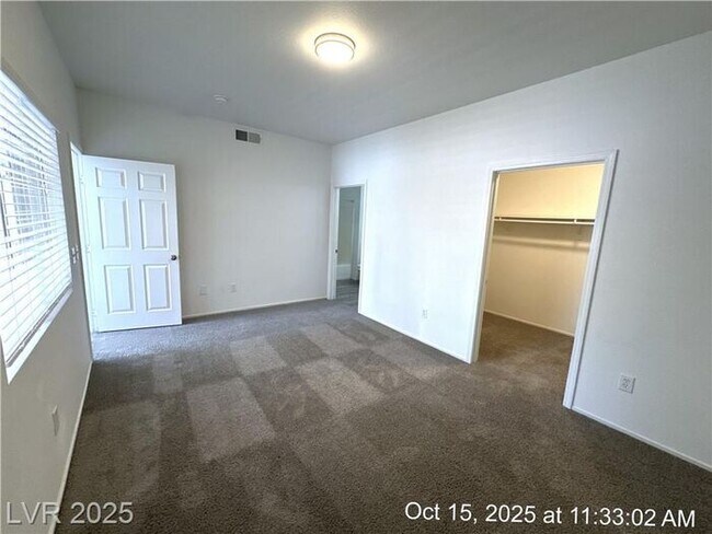 Building Photo - SPACIOUS FIRST-FLOOR CONDO LOCATED IN A GA...
