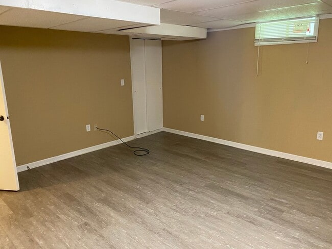 Building Photo - Spacious 4-Bedroom Home with Garage and Backyard in Milan!