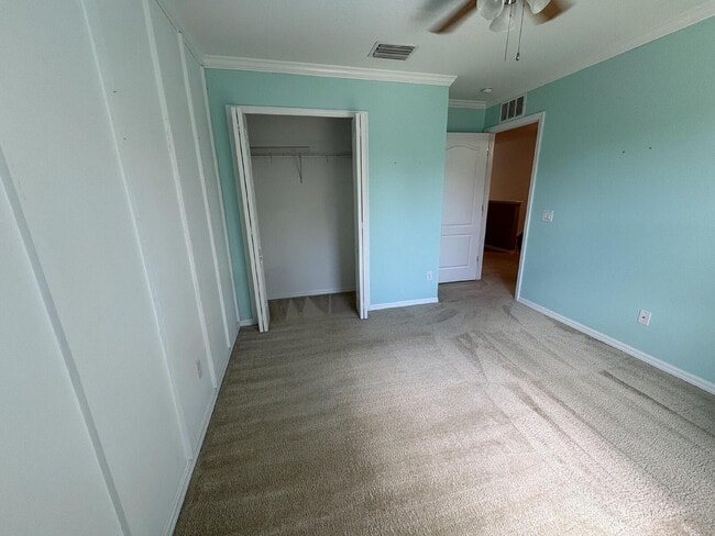 Building Photo - Spacious 5-Bedroom Pool Home with Putting ...