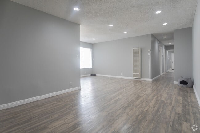 3BR,2BA-1100SF- Living Room - Lemp Apartments