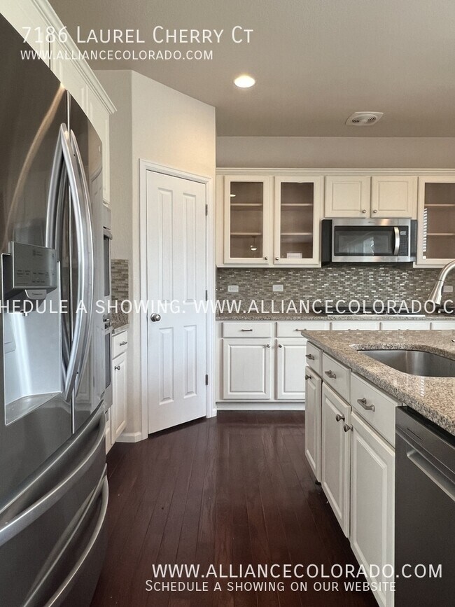 Building Photo - 7186 Laurel Cherry Ct