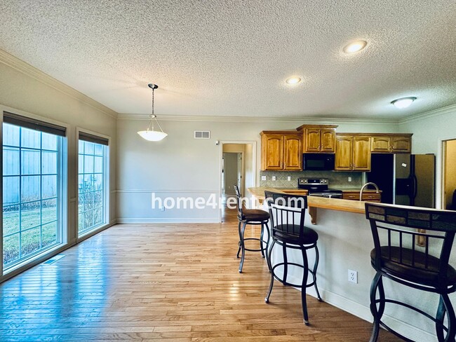 Building Photo - Maintenance Free! Main level Master, Finished Basement and Wood Floors in the Kitchen! *Brand New...