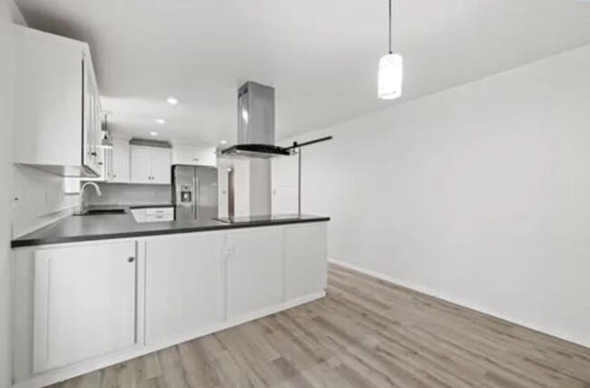 Building Photo - Elegant 4-Bedroom Home on a Corner Lot in ...