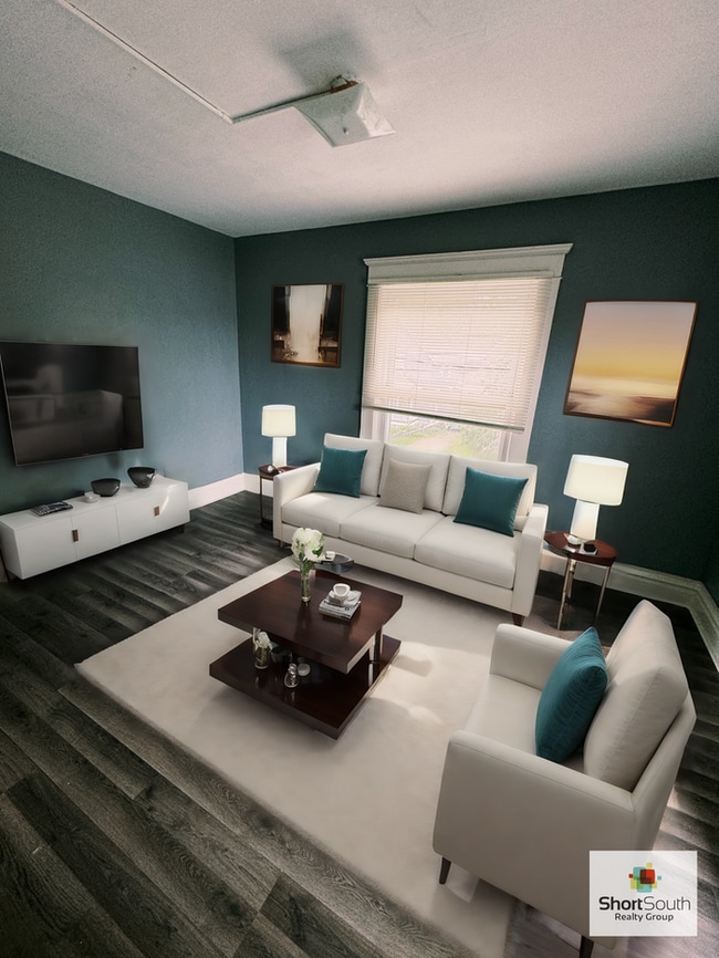 Building Photo - Updated 3 bed 1 bath upper apartment in Lansing