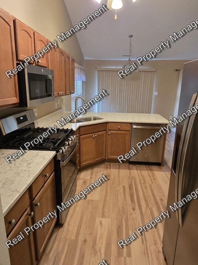 Building Photo - Maintenance Free Two Bedroom Townhome