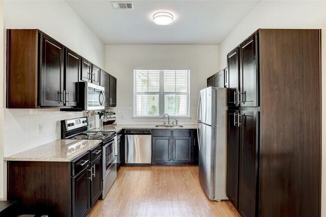 Building Photo - 2400 Louis Henna Blvd