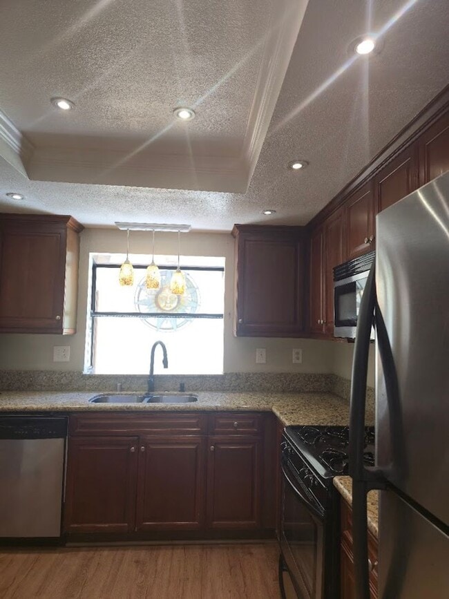 Building Photo - Light-Filled End Unit Condo, 2BD/2.5BA wit...