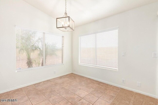 Building Photo - 6585 N 77th Dr