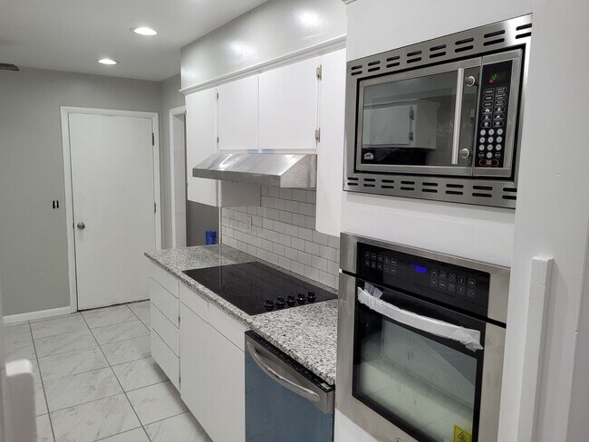 Building Photo - Remodeled 3 bedroom 2 bathroom house with 2 car garage and fenced yard