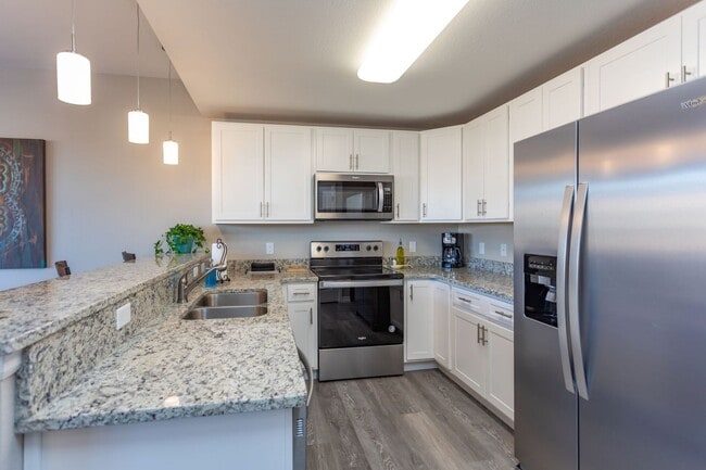 Building Photo - Stylish 3-Bedroom Townhome with Fireplace, Modern Kitchen & Spacious Layout!