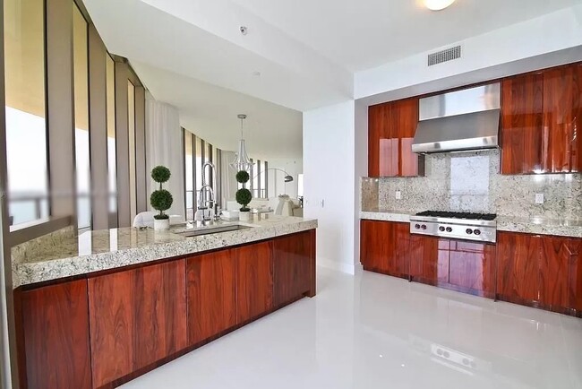 Gourmet kitchen - 9703 Collins Ave