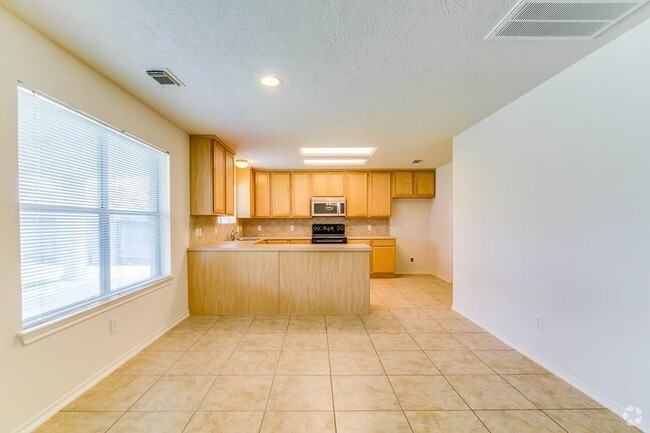 Building Photo - 8310 Coriander Ln