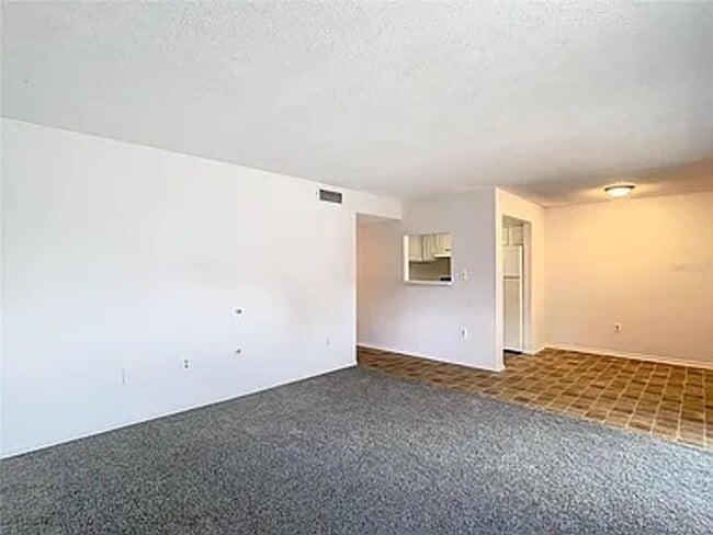 Building Photo - 2BR Condo Near UCF – All-Inclusive Living & Resort Amenities!