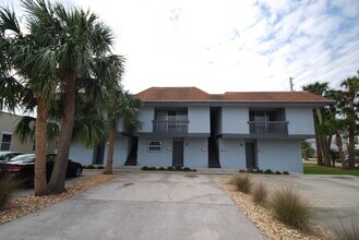 Building Photo - Beach Living at it's Best!  Two Bedroom/On...