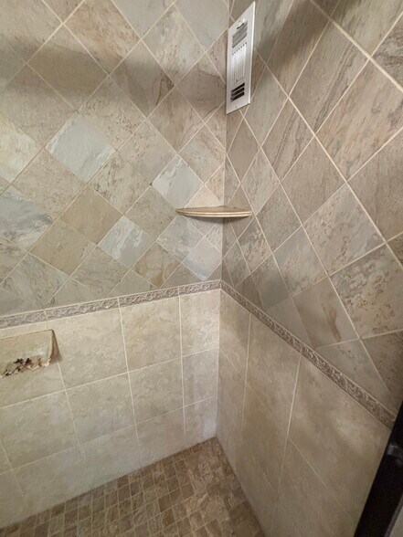 Tiled shower - 1330 New Hampshire Ave NW