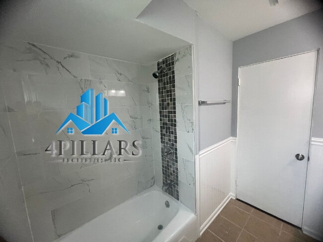 Building Photo - "Charming 2-Bedroom Gem with Finished Basement & Gleaming Hardwood Floors in Hammond!"