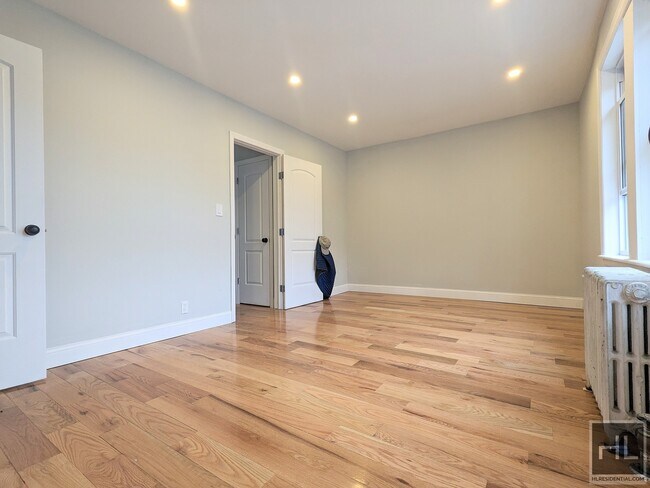 Building Photo - Beautiful Renovated Jackson Heights apartment