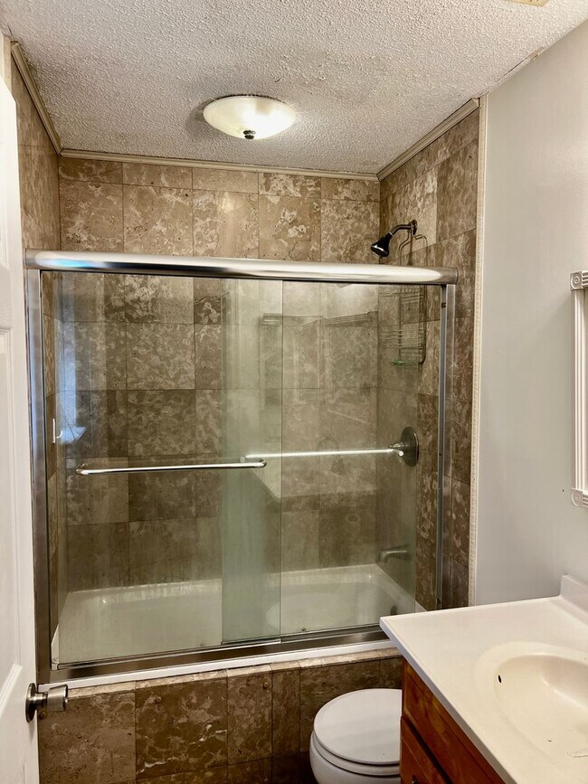 Building Photo - Charming 3-Bedroom, 2-Bathroom Home with Sunroom & Flex Room