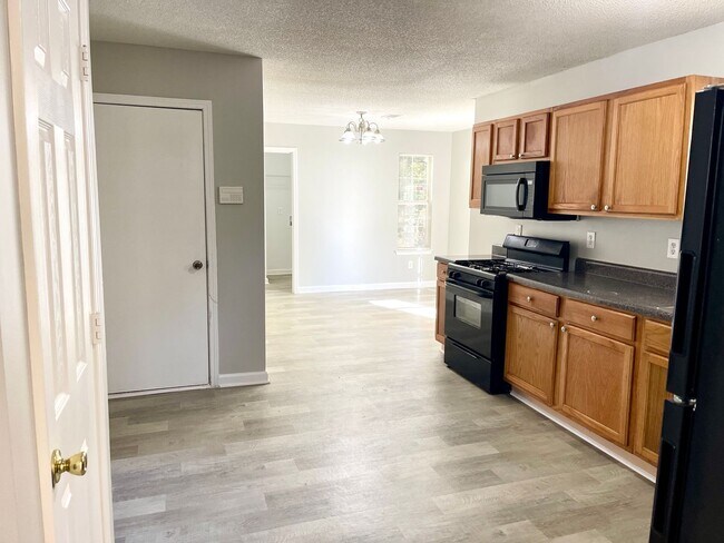 Building Photo - Welcome to this charming 3-bedroom, 2.5-bathroom home located in the desirable area of Ellenwood,...