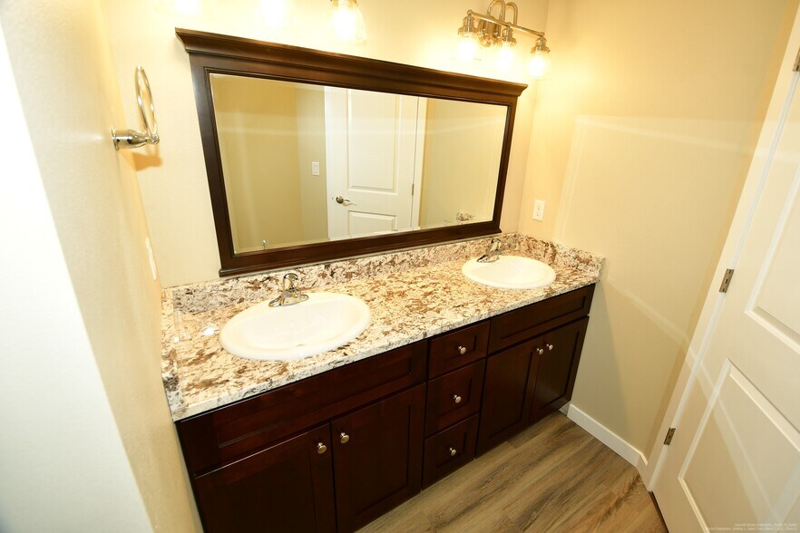 Bathroom with granite countertops - 958 152nd St E