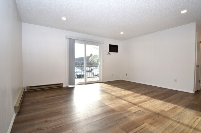 Building Photo - New Paint and Flooring throughout! Views of the Bridger Mountains!