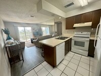 Building Photo - 1B/1B  Furnished Condo Across the Street from the Gulf of America!