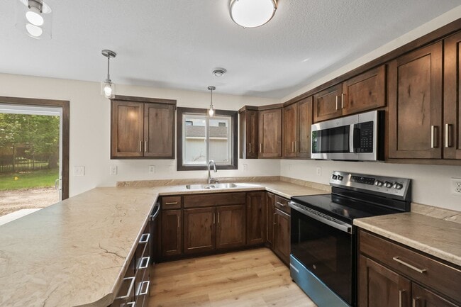 Building Photo - Brand New Townhome in Sartell!