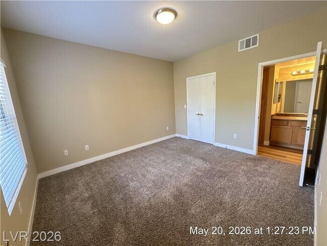 Building Photo - Gated Green Valley Condo with Dual Walk-In Closets & Resort Amenities