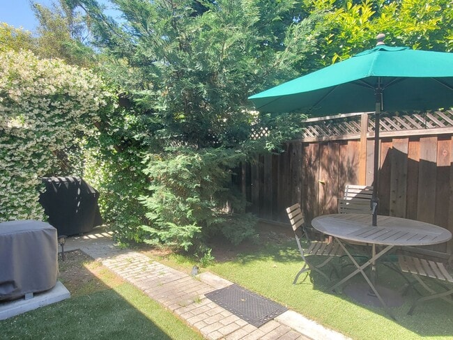 Building Photo - Cute Home in Great Location, A/C, W/D, Wood Floors, Remodeled Bathrooms, 2C Garage, Beautiful Yards!