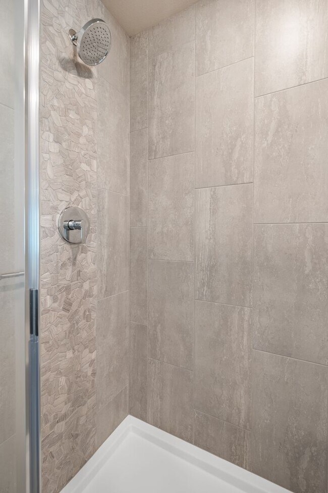 Building Photo - NEW CONSTRUCTION – Stylish 4-Bedroom Townh...