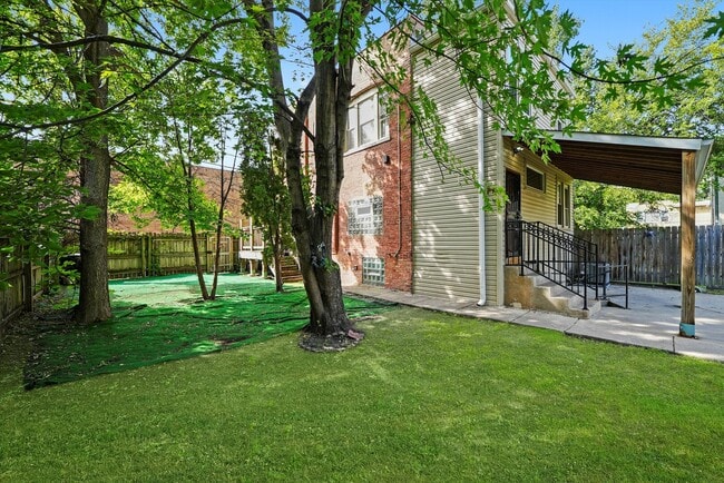 Building Photo - 6540 S Vernon Ave