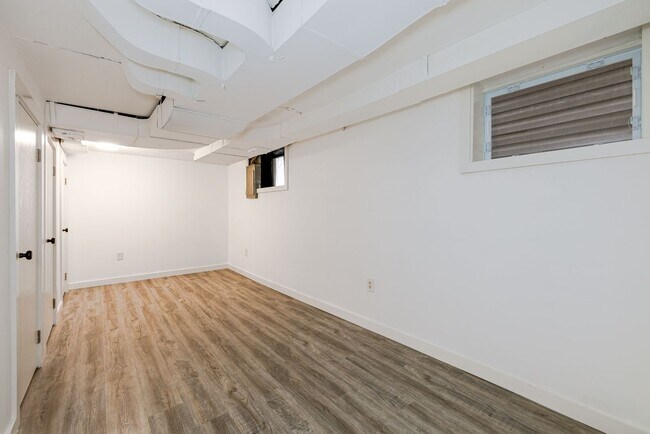 Building Photo - Charming home with a finished basement and...