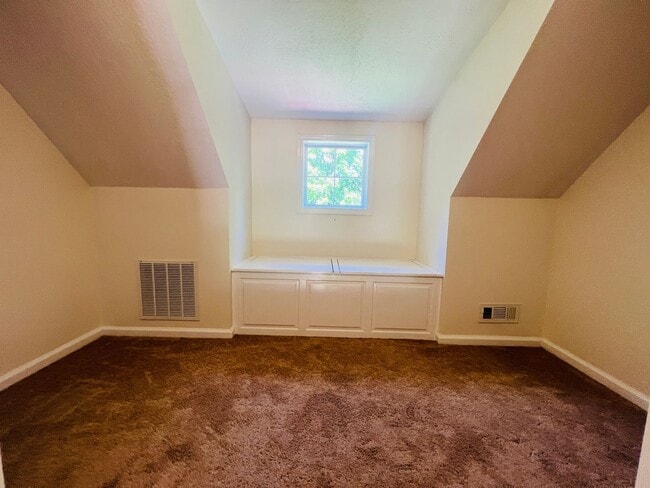 Building Photo - Unit is no longer available - application approved.  Charming 1 1/2 story brick home with basemen...