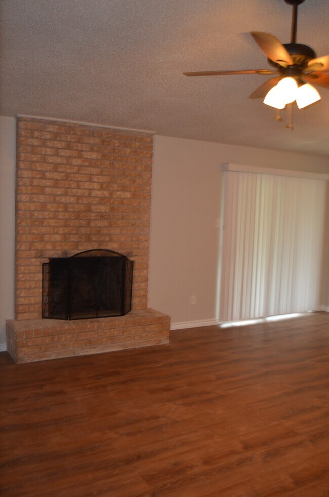 Building Photo - This 3 Bedroom Home with Fireplace is a must see!