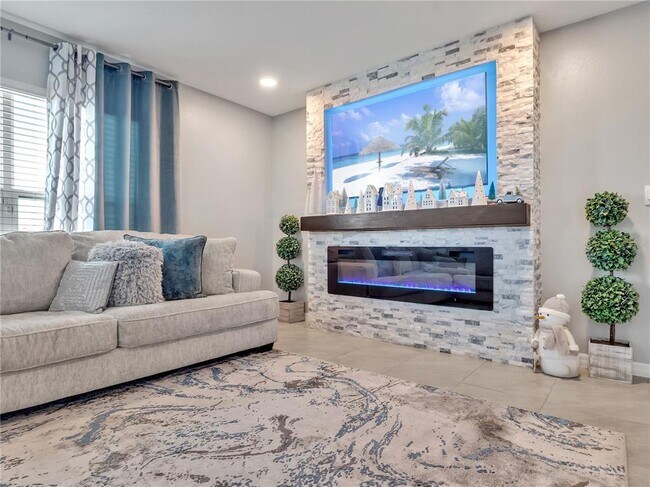 Building Photo - 5289 Fiddle Fig Ave