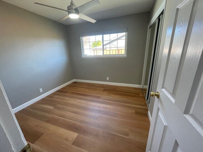 Building Photo - Spacious house with Skylights, Hardwood floors, Family room and Gardener