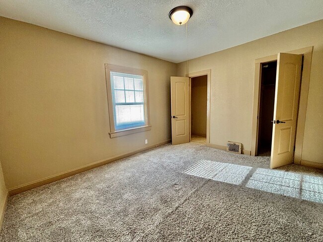 Building Photo - Spacious 2-Bedroom + Den Home with Ample Parking & Backyard!