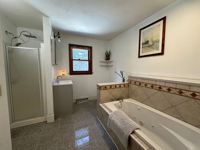Building Photo - Furnished 1-Bedroom Primary Suite