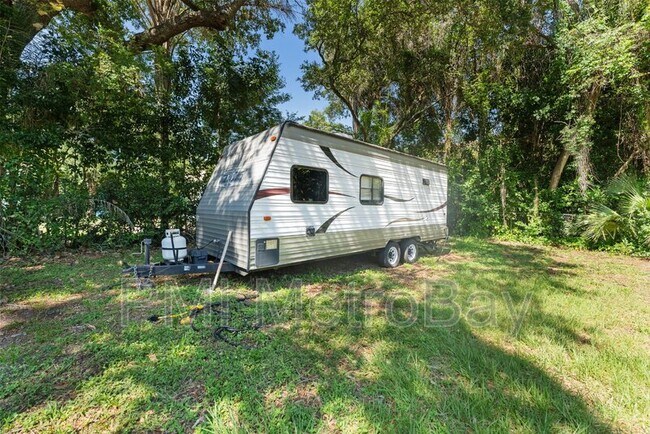 Building Photo - 4939 Woodland Dr