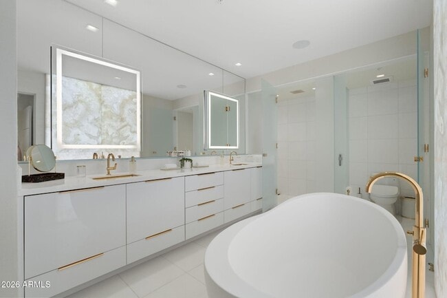 Building Photo - 6587 N Palmeraie Blvd