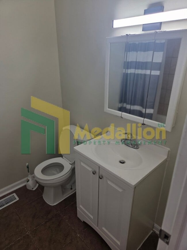 Building Photo - Updated 4-Bedroom Home with Finished Basement and Fenced Yard