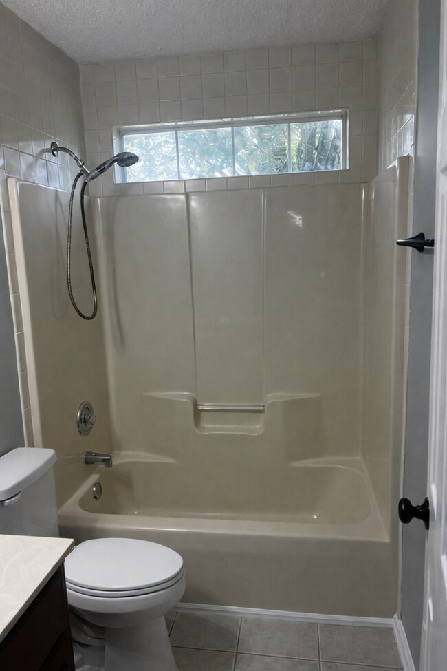 Building Photo - Charming All-Brick Corner Lot Home with Hot Tub & Fenced Yard