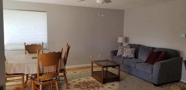 Building Photo - FURNISHED- 3 bed 2 bath single car detached garage, large lot Lawn care included