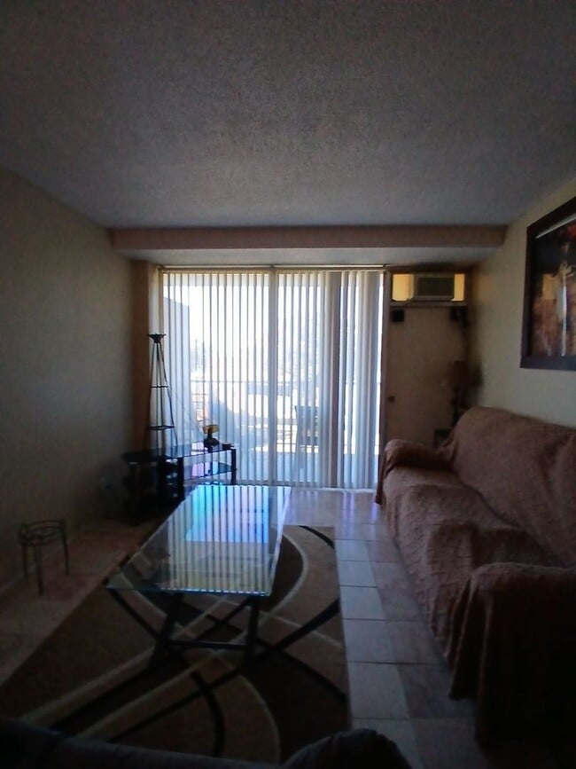 Building Photo - Premium 1-Bedroom in Gated Community: Move...